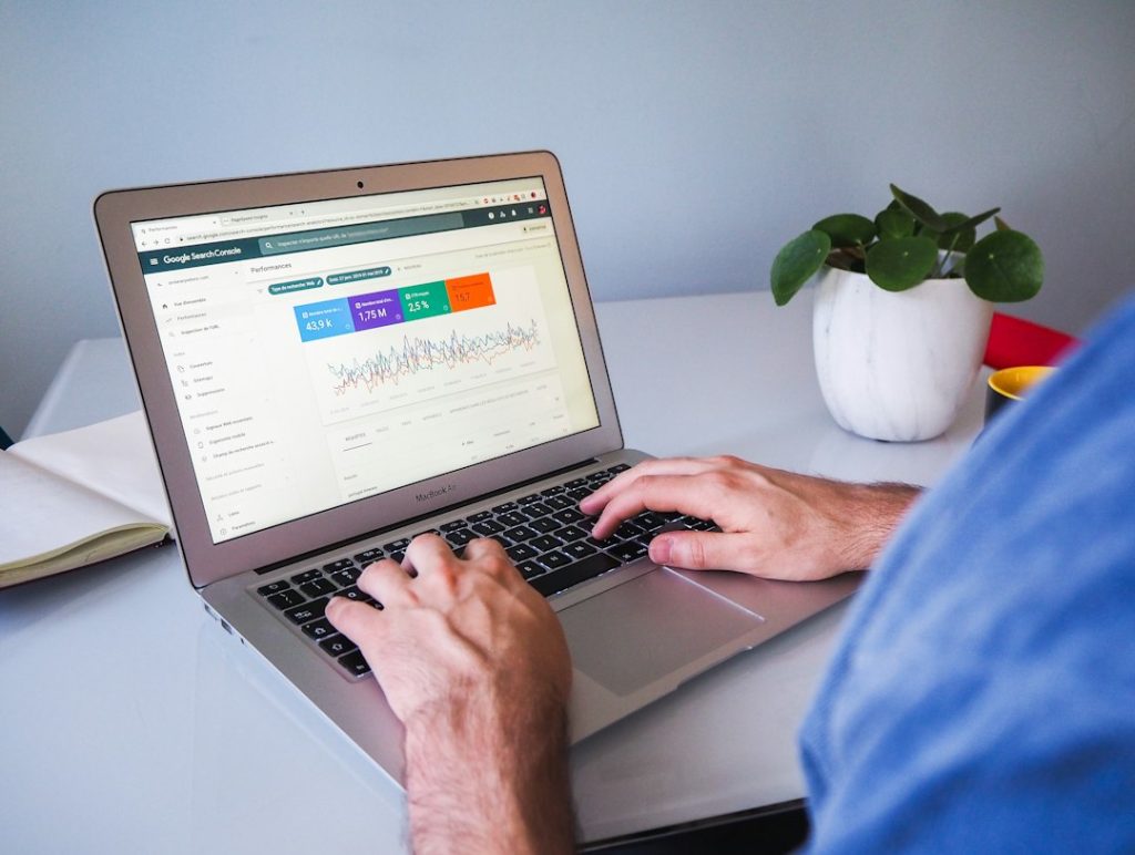 digital marketer reviewing keyword rankings on a dashboard